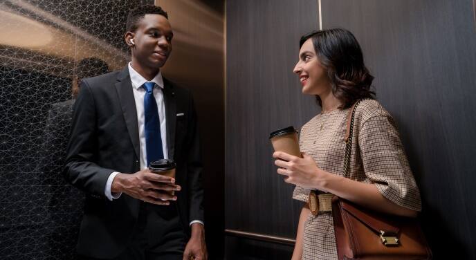 img_woman-man-elevator-688x376